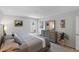 Tranquil bedroom boasts natural light, neutral tones, and a calming ambiance at 9940 47Th N Ave # 210, St Petersburg, FL 33708