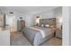 Inviting bedroom with a king-size bed, soft textures, and modern decor for ultimate comfort at 9940 47Th N Ave # 210, St Petersburg, FL 33708