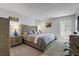 Serene bedroom featuring a comfortable bed, soft lighting, and a calming color palette at 9940 47Th N Ave # 210, St Petersburg, FL 33708