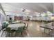 Spacious hall with tables and chairs, suitable for events and gatherings at 9940 47Th N Ave # 210, St Petersburg, FL 33708