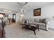 Cozy living room with comfortable seating and an open view to the updated kitchen area at 9940 47Th N Ave # 210, St Petersburg, FL 33708