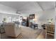 Cozy living room featuring neutral colors, plush seating, and natural light at 9940 47Th N Ave # 210, St Petersburg, FL 33708
