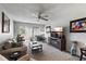 Cozy living room with comfortable seating, a ceiling fan, and a scenic view at 9940 47Th N Ave # 210, St Petersburg, FL 33708