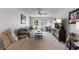 Comfortable living room with plush seating, and a large window for natural light at 9940 47Th N Ave # 210, St Petersburg, FL 33708