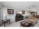 Inviting living area with an open floor plan, seamlessly connecting to the dining and kitchen spaces at 9940 47Th N Ave # 210, St Petersburg, FL 33708