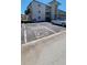 Parking area shows designated parking spots and the exterior of the building at 9940 47Th N Ave # 210, St Petersburg, FL 33708