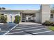 Bay Pines condo recreation center with accessible parking and exterior walkway at 9940 47Th N Ave # 210, St Petersburg, FL 33708