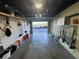 Well-lit garage; with room for parking and storage, and an open door at 100 Bluff View Dr # 502C, Belleair Bluffs, FL 33770