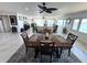 View of the dining and living spaces including waterfront views at 100 Bluff View Dr # 502C, Belleair Bluffs, FL 33770