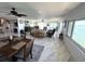 Bright and airy living room featuring water views, marble floors, and comfortable seating at 100 Bluff View Dr # 502C, Belleair Bluffs, FL 33770