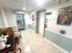 Complex lobby entrance with light tile flooring and elevator access at 100 Bluff View Dr # 502C, Belleair Bluffs, FL 33770