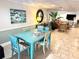Lounge area offering a blue table and chair set with floral pattern seating at 100 Bluff View Dr # 502C, Belleair Bluffs, FL 33770