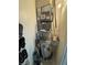 Utility closet showcasing water heater, HVAC and storage solutions at 100 Bluff View Dr # 502C, Belleair Bluffs, FL 33770