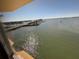 Water view from the window of a home including a bridge, water and boats at 100 Bluff View Dr # 502C, Belleair Bluffs, FL 33770