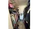 Large walk-in closet with built-in shelving and ample storage space at 100 Bluff View Dr # 502C, Belleair Bluffs, FL 33770