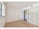Inviting bedroom features ample closet space and bright window views at 11485 Oakhurst Rd # A202, Largo, FL 33774