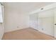 Comfortable bedroom with a spacious closet and window bringing in natural light at 11485 Oakhurst Rd # A202, Largo, FL 33774