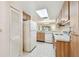 Bright kitchen area with ample cabinet space and appliances at 11485 Oakhurst Rd # A202, Largo, FL 33774