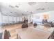 Large meeting room featuring tile floors and abundant natural light at 11485 Oakhurst Rd # A202, Largo, FL 33774