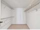 Spacious walk-in closet with wire shelving offers ample storage for clothes and accessories at 11485 Oakhurst Rd # A202, Largo, FL 33774