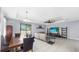 Open concept living and dining area is spacious and well-lit at 11872 Thicket Wood Dr, Riverview, FL 33579