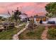 Lush backyard with patio area and landscaping, perfect for enjoying outdoor living and gatherings at 12821 5Th Isle, Hudson, FL 34667