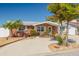 Inviting brick home with a well-maintained lawn, creating a warm and welcoming atmosphere at 12821 5Th Isle, Hudson, FL 34667