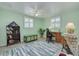 Versatile office space with natural light, wood floors, and storage options at 12821 5Th Isle, Hudson, FL 34667