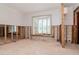 Living room with a bay window letting in natural light at 201 S Treasure E Dr, Tampa, FL 33609