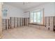 Image of living room featuring a bright bay window with shutters at 201 S Treasure E Dr, Tampa, FL 33609