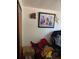 A well-lit bedroom featuring walls adorned with framed art, a closet, and ample natural light at 2110 Oakley S Ave, St Petersburg, FL 33712