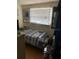 A small bedroom with a window at 2110 Oakley S Ave, St Petersburg, FL 33712