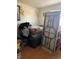 This bedroom, though untidy, shows a comfortable space with a sturdy folding table, perfect for various activities at 2110 Oakley S Ave, St Petersburg, FL 33712