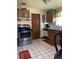 Traditional kitchen featuring stainless steel appliances, tile flooring and plenty of cabinets at 2110 Oakley S Ave, St Petersburg, FL 33712