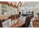 Dining room with ample natural light, tile flooring, and neutral walls at 2676 Tanglewood Trl, Palm Harbor, FL 34685