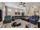 Open living room with high ceilings, tile flooring, and large windows at 2676 Tanglewood Trl, Palm Harbor, FL 34685