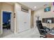 A multi-functional home office with a double closet and an adjoining bedroom creates flexible living at 2676 Tanglewood Trl, Palm Harbor, FL 34685