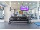 Community gym featuring ample workout equipment, mirrors and televisions at 28923 Lucero Ln, Wesley Chapel, FL 33543