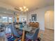 Open concept living room and dining room featuring views to other areas of the home at 28923 Lucero Ln, Wesley Chapel, FL 33543