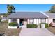 Charming single-story home with well-maintained landscaping and a cozy front patio area at 3914 41St W St, Bradenton, FL 34205