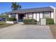 Charming single-story home with well-maintained landscaping and a cozy front patio area at 3914 41St W St, Bradenton, FL 34205