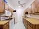 Kitchen with wooden cabinets and appliances at 3914 41St W St, Bradenton, FL 34205