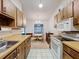 Kitchen with wooden cabinets and appliances at 3914 41St W St, Bradenton, FL 34205