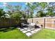 Cozy backyard patio with comfortable seating, perfect for relaxing and enjoying the outdoors at 4036 56Th N Ave, St Petersburg, FL 33714