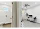 Bright bathroom with a white tiled shower, sink and view to the office at 4036 56Th N Ave, St Petersburg, FL 33714