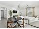 Stylish dining area with modern table and chairs, and lots of natural light at 4036 56Th N Ave, St Petersburg, FL 33714