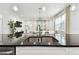 Modern kitchen with stainless steel sink and a view of the open-concept living area at 4036 56Th N Ave, St Petersburg, FL 33714