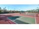 Outdoor tennis and pickleball courts in a beautiful Florida community, with shaded benches to take a break from the action at 5073 Stone Harbor Cir, Wimauma, FL 33598