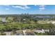 Breathtaking aerial shot of a neighborhood with a golf course and cityscape views in the distance at 515 34Th Ne Ave, St Petersburg, FL 33704