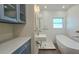 Stylish bathroom with a sleek vanity, soaking tub, and modern fixtures at 515 34Th Ne Ave, St Petersburg, FL 33704